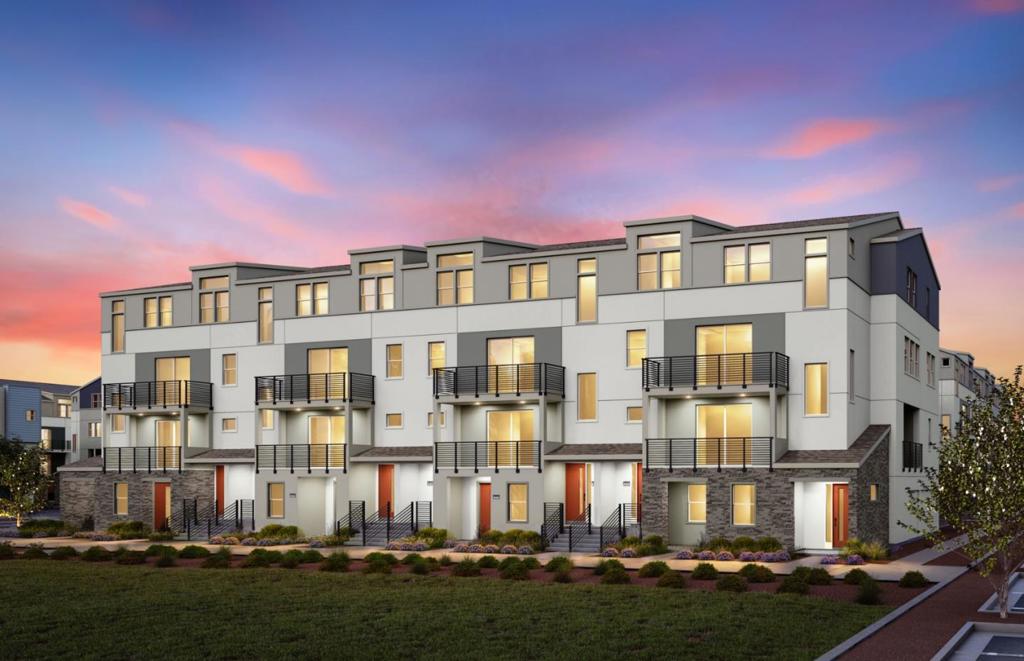 Rise Plan 2 at the District offers two- story living with the living, kitchen, family room, and bedrooms on one floor. This home includes upgraded quartz countertops, luxury vinyl plank flooring throughout, and upgraded KitchenAid appliances.