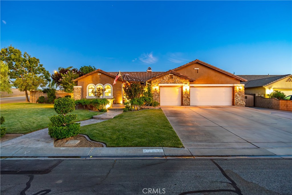 ***LIVE BEAUTIFULLY*** Elegant 5-Bedroom Estate with Luxurious Upgrades & Exceptional Features - Nearly 4,000 Sq Ft. Welcome to this expansive and meticulously upgraded 5-bedroom, 3.5-bathroom estate, offering nearly 4,000 sq ft of thoughtfully designed living space. Nestled on a generously sized lot, this property perfectly blends elegance, functionality, and comfort—ideal for growing families, entertainers, or those seeking room to roam. Step inside and be greeted by new plush carpeting in the living room, dining room, and family room, creating a warm and welcoming ambiance. The chef's kitchen is a true culinary haven, featuring porcelain countertops, double ovens, a sleek stovetop pot filler, and an abundance of space for entertaining. The adjacent laundry room is enhanced with additional overhead cabinetry for optimal organization. Enjoy year-round comfort with a ducted, thermostat-controlled swamp cooler, and ceiling fans in all bedrooms—plus one in the luxurious master bathroom, which also showcases upgraded tile and travertine solid surface countertops, echoing the refined finishes found in all bathrooms throughout the home. Tech-savvy and holiday-ready, the exterior boasts numerous outlets at the base and eaves, controlled by a separate switch—perfect for holiday lighting displays. The 5-channel ceiling surround sound system elevates your movie nights and gatherings to the next level. The spacious 3-car garage offers extra-deep bays, attic storage with a pull-down ladder, added lighting and outlets, and a stamped concrete walkway and porch for extra curb appeal. Oversized RV parking easily accommodates large rigs with slide-outs extended—ideal for adventure lovers or additional guests. This rare property brings together high-end upgrades, abundant space, and thoughtful design in every detail. Don't miss the opportunity to own this exceptional home that truly has it all!