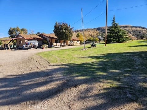Photo of 46720 Kings Canyon RD, Lancaster, CA 93536 (MLS # SR26214240)