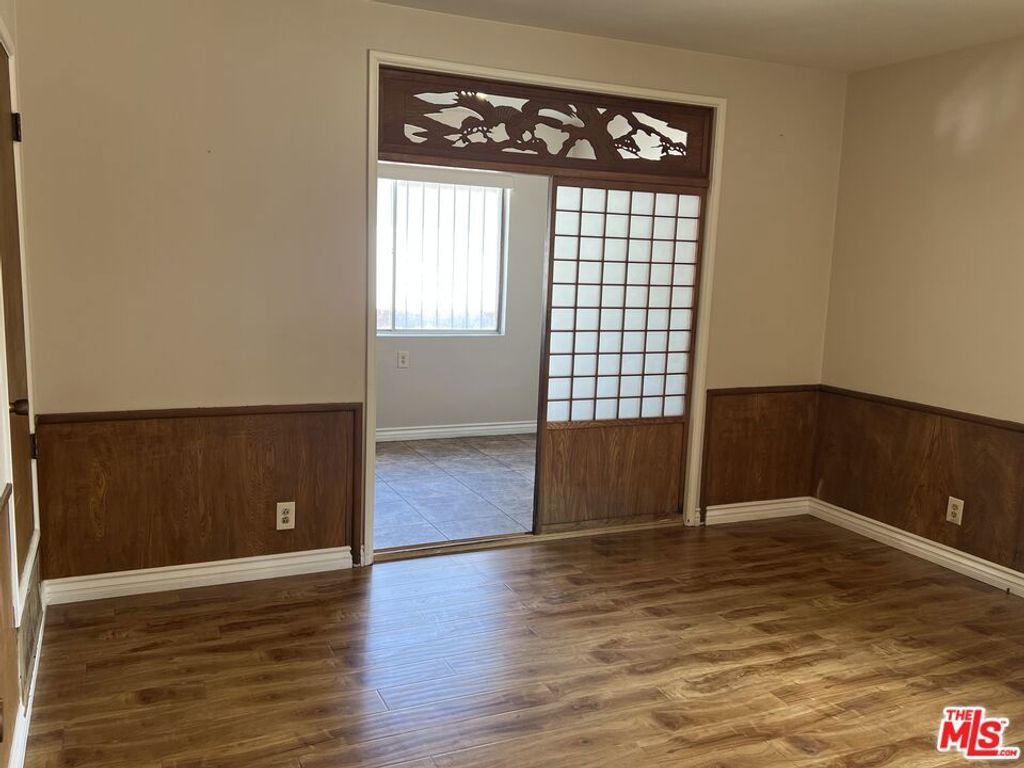 Photo of 3861 S Norton Avenue, Los Angeles, CA 90008 (MLS # 25608065)