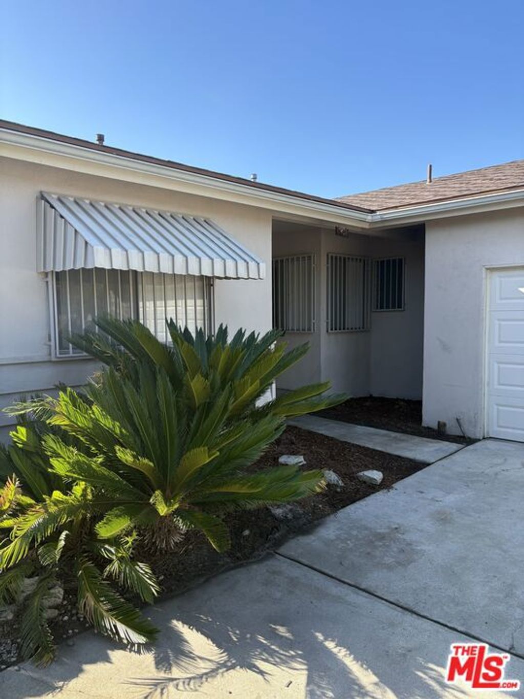 Photo of 3861 S Norton Avenue, Los Angeles, CA 90008 (MLS # 25608065)