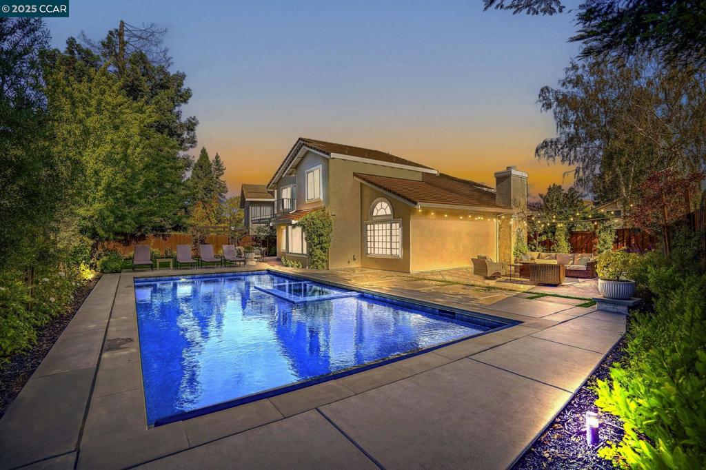 Welcome to your dream home in San Ramon's highly desirable Canyon Crest neighborhood! This beautifully updated 4-bedroom, 3-bath residence offers 2,824 sqft of elegant and comfortable living. Step inside to bright, open living and dining spaces filled with natural light. The spacious primary suite features a custom walk-in closet and a stunningly remodeled bath with high end fixtures, designed for relaxation. Completely upgraded chefs kitchen featuring a 6 burner Wolf stove and hood, stainless steel appliances, gleaming quartz countertops and plenty of storage. Upon entry, experience the stunning upgraded staircase with wainscoting. All new doors and light fixtures throughout! Newer energy efficient HVAC system and EV outlet. Nearly every detail has been thoughtfully upgraded, with over $450,000 in recent improvements throughout the home! Step outside to your large, private backyard retreat - a true entertainer's paradise with a newer sparkling saltwater pool, relaxing spa, motorized pool cover and a 6 speaker Sonos sound system for exceptional outdoor enjoyment. Located within walking distance to award-winning Golden View Elementary and close to shopping, dining, parks and just minutes to freeway access, this home combines luxury, convenience and the best of San Ramon living.