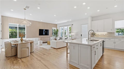 Photo of 9327 Astor, Irvine, CA 92618 (MLS # OC26132427)