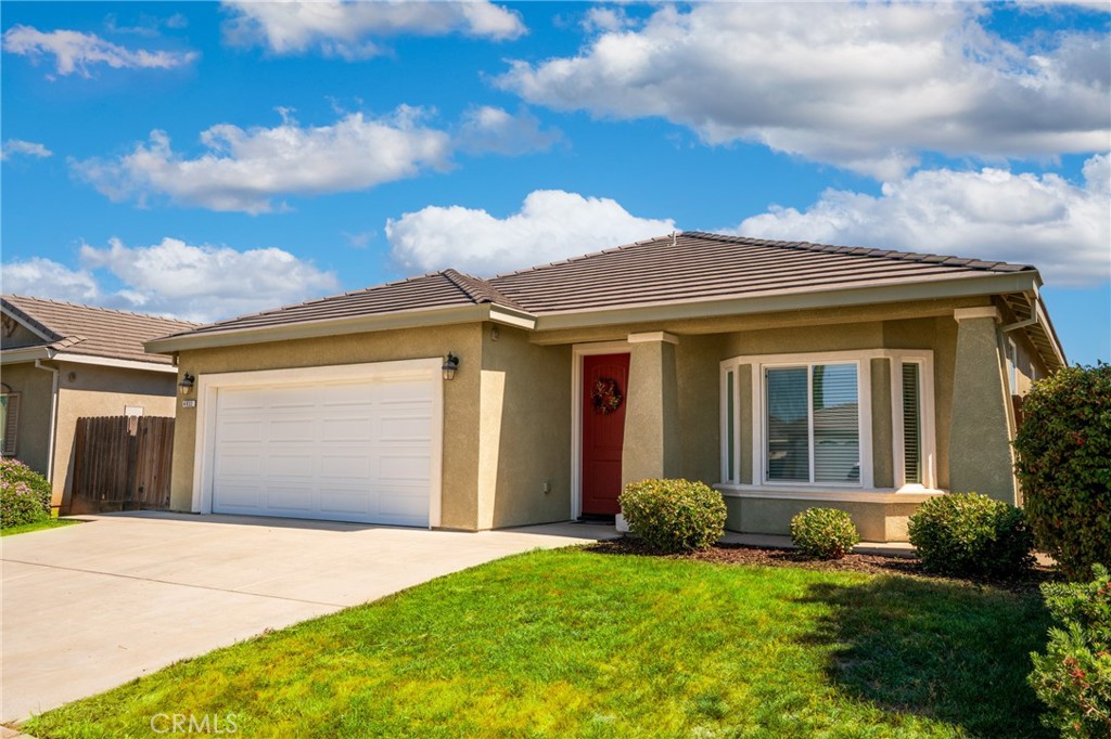 Open and Airy This beautiful home was built in 2016 and features high ceilings with a spacious living area that opens to the kitchen. The kitchen includes a large breakfast bar, a separate island, and plenty of cabinet space. There are four bedrooms and two bathrooms. Enjoy a low maintenance backyard. A great choice you don't want to miss!