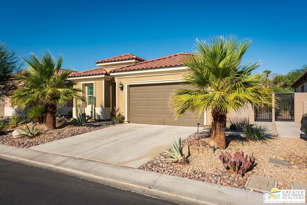Welcome to 74 Cork Tree, located in the highly sought-after 55+ active adult community of Del Webb Rancho Mirage. This popular Solitude floor plan, just 4 years young, showcases a wealth of builder upgrades including Lux package cabinetry, quartz countertops, upgraded bedroom carpeting, a double sliding glass door in the living room, and a spacious covered patio that extends the entire length of the home. The backyard is truly an oasis, featuring a private pool, desert-friendly landscaping, a Weber gas grill, outdoor security screen, and most notably, breathtaking mountain views. Beyond your private retreat, the community offers endless amenities to match your lifestyle indoor and outdoor pools, a state-of-the-art fitness center, tennis and pickleball courts, and a welcoming clubhouse filled with clubs and activities for every interest. Del Webb Rancho Mirage is celebrated by residents for its prime location, convenience, and friendly atmosphere. Don't miss your chance to experience the perfect setting for your next chapter schedule a showing today!