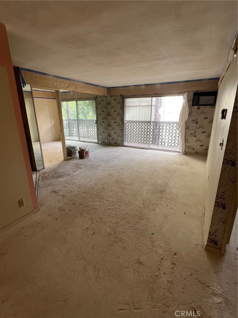 HIGHLAND PARK FIXER-UPPER & PROBATE SALE: Your Blank Canvas in a Prime NELA Location! This is the opportunity you've been waiting for! Located in the highly sought-after Arroyo Seco Village Community in vibrant Highland Park, this 2nd-floor condo is ready for a full-scale renovation. This unit has been stripped down to a blank slate, offering an unmatched value-add proposition for investors or an end-user ready to design their dream home.
The interiors are completely primed for your vision: all flooring has been removed, the kitchen is distressed and needs all-new cabinets and appliances, and the bathrooms require complete updating, including addressing exposed drywall in the primary bath (due to a past leak). This is your chance to install the custom floors, designer kitchen, and luxurious bathrooms you’ve always wanted. Enjoy a leisurely lifestyle just steps from Highland Park's best. You're minutes from the trendy shops, eclectic eateries (including many vegan options), and vibrant nightlife along Figueroa St and York Blvd. The secure, gated Arroyo Seco Village complex offers exceptional amenities, including an elevator for easy access to your second-floor unit, a pool, spa/Jacuzzi, BBQ areas, and lush grounds. The unit includes one assigned parking space. Plus, you have the convenience of in-unit washer and dryer hookups. With a median home price over $1M in Highland Park (90042), this is a rare chance to enter the market at a builder's price and customize a premier residence. Bring your contractor and your design dreams! Listing Broker represents Seller Exclusively. Please connect with your favorite realtor to scheduled a showing. ALL Information is in the MLS. ** CASH ONLY **