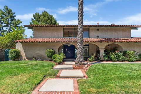 Photo of 21727 Ulmus Drive, Woodland Hills, CA 91364 (MLS # SR26030242)