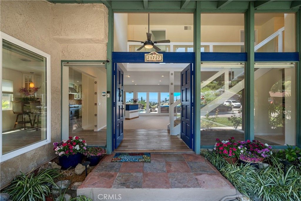 Photo of 21727 Ulmus Drive, Woodland Hills, CA 91364 (MLS # SR26030242)