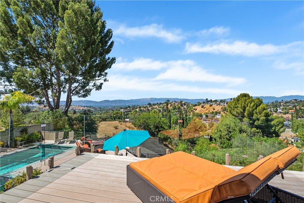 Photo of 21727 Ulmus Drive, Woodland Hills, CA 91364 (MLS # SR26030242)