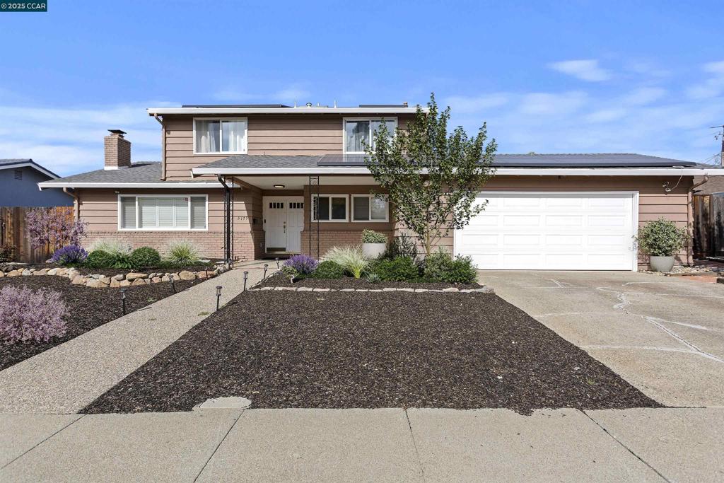 This stunning home offers the perfect blend of contemporary design and comfortable living. With 4 spacious bedrooms and 2 bathrooms upstairs and an additional room and 1/2 bath downstairs, this home provides ample space for all your needs. Step inside to discover it is move in ready. The downstairs, completely remodeled with a kitchen to please any cook: double ovens, gas cooktop and lots of storage. Large windows or beautiful wood framed glass doors add light in every room. Cozy up by the working fireplace on in the formal living room or hang out in the family room watching a movie. The versatile layout allows you to be formal or familiar, whatever the gathering dictates. The exterior is equally impressive, with a private below-ground pool perfect for summertime relaxation or entertaining guests. Large side yards offer plenty of storage and room to park your boat, RV or other large toys. Practically, the home is equipped with solar, ensuring comfort throughout the year without the energy bill! Don't miss the opportunity to own this exceptional property. Situated near the Concord/Clayton line, it has all the conveniences of shopping, schools and outdoor adventure.