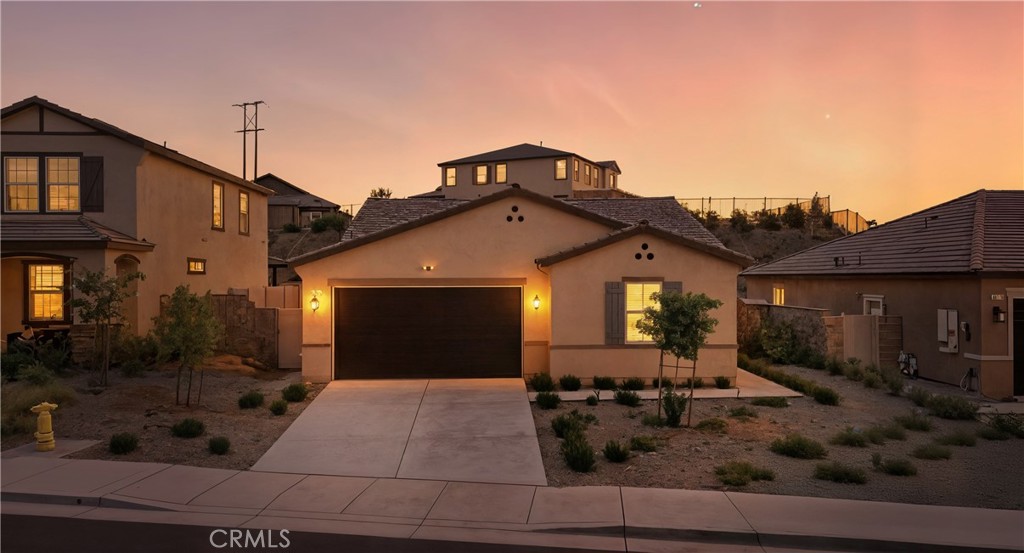 Welcome to this modern single-story home built in 2022, located in the highly sought-after Rosetta Canyon community. Offering 4 bedrooms, 2 bathrooms, and 2,205 square feet of thoughtfully designed living space, this home blends style, efficiency, and comfort.
The open-concept floor plan features a spacious kitchen with a center island, walk-in pantry, and stainless steel appliances—seamlessly connecting to the dining and living areas, perfect for gatherings and everyday living. The private primary suite includes a soaking tub, walk-in shower, dual sinks, and a large walk-in closet. Three additional bedrooms offer flexibility for guests, home office, or hobbies.
Enjoy the piece of mind and savings of PAID-OFF SOLAR PANELS, a 2-car attached garage, plus 2-car driveway parking, and a generously sized 8,712 sq ft lot—with a backyard ready for your personal vision.
Situated within walking distance to Earl Warren Elementary and Rosetta Canyon Sports Park, and just minutes to shopping, dining, Lake Elsinore Outlets, Storm Stadium, and the 15 Freeway. Also located within a short drive to Glen Ivy Hot Springs, this property presents great short-term rental income potential (buyer to verify local ordinances and rental regulations).
Don’t miss this rare opportunity to own a nearly new, energy-efficient home in one of Lake Elsinore’s most established neighborhoods.
*The backyard image has been digitally enhanced to showcase possible improvements. Actual condition is a blank slate, ready for your vision*
