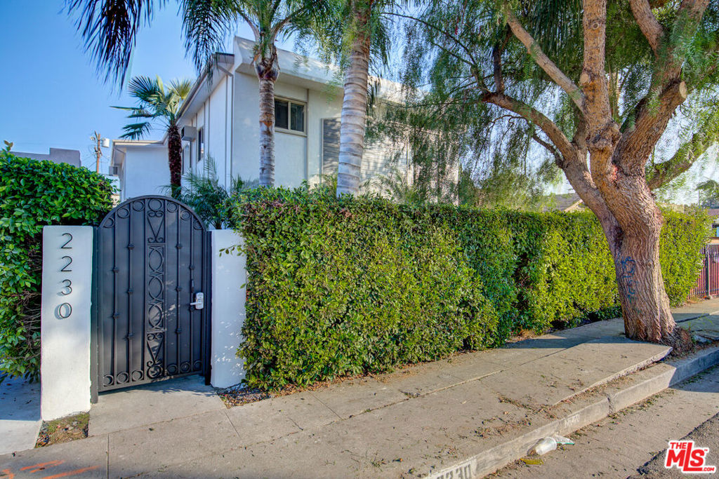 Privately tucked behind mature hedges in the heart of Mid-City, this beautifully updated 4-unit income property presents a rare opportunity to invest in one of LA's most rapidly evolving neighborhoods, just minutes from Culver City. All four units have been thoughtfully renovated in recent years, blending a clean, contemporary aesthetic with the charm of the original architecture. The fully updated building features three spacious 2-bedroom/1-bath units and one oversized 3-bedroom/2-bath unit with sweeping views from multiple angles. Each unit is filled with natural light, and the interiors are well-maintained making this a true turn-key opportunity for investors or potential owner-users. With over 4,400 square feet of living space on a 7,200-square-foot lot, the property also offers excellent potential for expansion or the addition of ADUs (buyer to verify feasibility with the city). All units are currently leased at near-market rents to reliable tenants, currently producing a solid 5.1% cap rate. With an addition of an ADU the property fully optimized is projected at 6.7 % Cap rate. The gated property offers both privacy and convenience, with tall hedges, one off-street parking space per unit, and ample street parking. Ideally located close to the Expo Line, downtown Culver City, and neighborhood hotspots like Helms Bakery, Alta Adams, Vicky's All Day, Chulita, Cento, and Mizlala. An exceptional, income-generating asset in a high-demand central location.