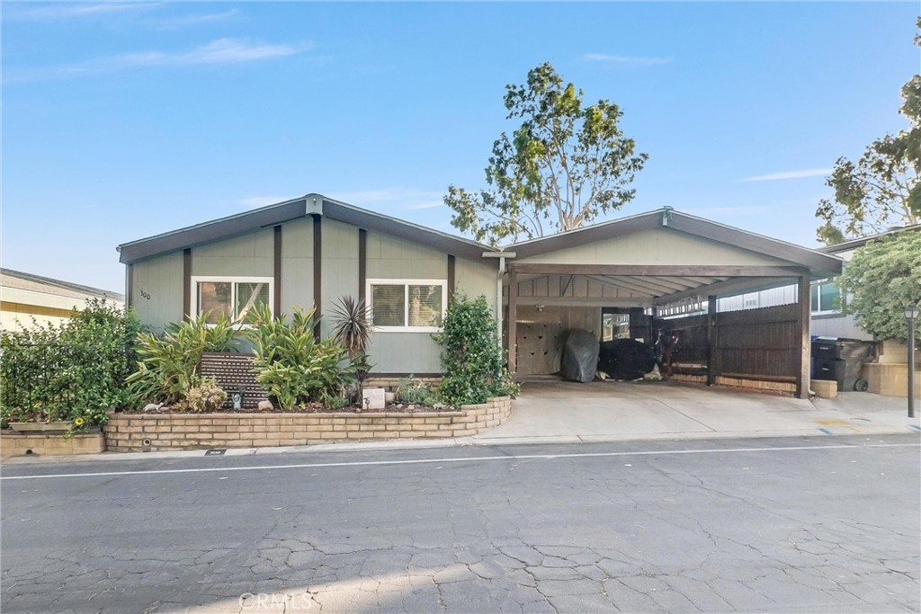 Beautiful 3-Bedroom Home in Premier 55+ Community – Valencia Lea-Mountain Shadows Park, Highland
Welcome to Valencia Lea-Mountain Shadows Park, one of Highland’s most desirable 55+ communities, nestled just outside the scenic San Bernardino Mountains. This well-maintained 1982 Fleetwood manufactured home offers 1,536 sq. ft. of comfortable living space, featuring 3 spacious bedrooms and 2 full bathrooms. Perched at the top of the community on a low-traffic street, this home offers added privacy and peaceful surroundings. Step inside to discover numerous upgrades throughout, including flooring, paint, and a beautifully remodeled kitchen complete with granite countertops, a large center island, new dishwasher, gas cooktop, and included refrigerator.
The open-concept layout provides an expansive living and dining area filled with natural light from the many windows. A charming decorative fireplace serves as the focal point of the living room, adding warmth and character. Just off the kitchen, a cozy family room features a sliding glass door that leads to a private back porch—perfect for relaxing or entertaining. The primary suite offers a beautifully updated bathroom with modern barn doors, a large closet, and a step-in glass shower for ease of use. Outside, enjoy a low-maintenance, mature landscaped yard, complete with a fence for added privacy and space for outdoor seating or a BBQ area. Located near shopping centers, restaurants, and major freeways, this home offers the perfect blend of comfort, convenience, and community. The separate laundry room includes washer, dryer, additional storage, and direct access to the covered carport—making grocery trips convenient.
Don’t miss your chance to own this charming home in a peaceful and well-kept neighborhood!