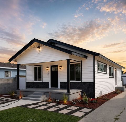 Photo of 324 E 84th Street, Los Angeles, CA 90003 (MLS # DW26114449)