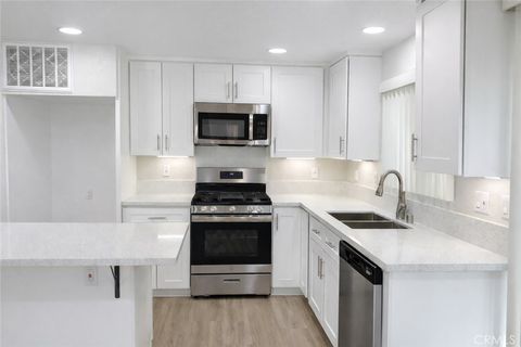 Photo of 9156 Burke Street #9, Pico Rivera, CA 90660 (MLS # DW26054774)