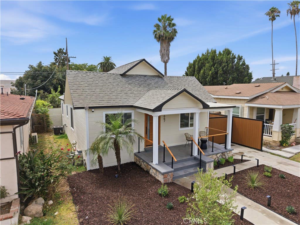 Photo of 3667 Cimarron, Los Angeles, CA 90018 (MLS # SR26151752)