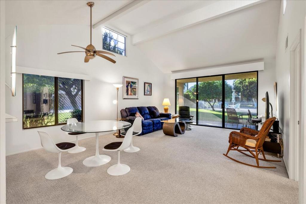 Welcome to 6735 Harwood Circle -- built in 1991, a beautifully maintained 2 bed, 2 bath condo in the highly desirable Cathedral Canyon Country Club. This single-level home offers 1,486 sq ft of open living space with vaulted ceilings, a step-down wet bar, and dual primary suites for maximum comfort and privacy. Enjoy abundant natural light from the south-facing orientation, plus mountain views from the back patio. The kitchen features tile countertops, a gas range, and plenty of cabinet space. Relax or entertain on the private front courtyard or the spacious back patio. The two-car attached garage offers direct entry and extra storage. Located in a secure, guard-gated community, you'll have access to an 18-hole golf course, tennis courts, multiple pools, and a spa. Just minutes from downtown Palm Springs, restaurants, shopping, and hiking trails. This is your chance to enjoy resort-style living in the heart of the desert!