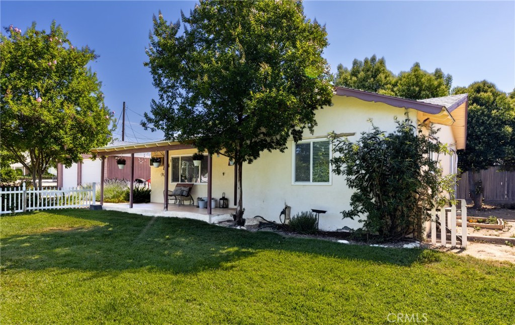 Welcome to your slice of quiet paradise! This darling single-story home sits on a spacious 15,000+ sq ft lot, offering room to grow, space to breathe, and options to make it your own. Whether you’re a first-time buyer looking for a home you can grow into, someone seeking a cozy and comfortable lifestyle, or an investor eyeing room for an ADU or adding units - this property delivers.
Step onto the inviting front porch, perfect for morning coffee under the trees, or enjoy evenings on the private back patio surrounded by garden beds and space to plant your dream orchard. There's even RV parking for your weekend adventures.
Inside, the home is well laid out with plenty of natural light, and outside, the property boasts a beautiful view of the mountains and the kind of peace and privacy that’s hard to find — yet you're still just minutes to town, great schools, and commuter-friendly access. You will want to see this home before it's gone.