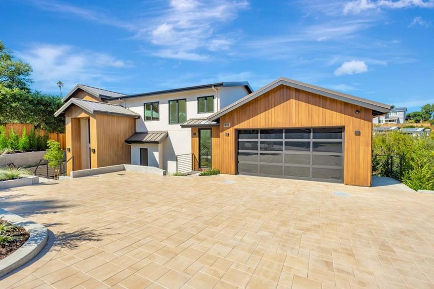 Welcome to this stunning 4-bedroom, 4-bathroom home located in the desirable Emerald Hills. Spanning 3,606 square feet, this spacious residence is perfect for comfortable living and entertaining. The beautifully designed kitchen is a chefs dream, featuring a gas oven range, hood over range, an island, garbage disposal, refrigerator, and a wine refrigerator. Hardwood flooring flows throughout the home, providing a warm and elegant touch. The home boasts a separate family room, and the main living area is enhanced with high ceilings and a cozy fireplace. The primary suite offers a luxurious retreat with an oversized tub, heated floors, smart toilet, stall shower, and a walk-in closet. Additional amenities include a video/audio wiring with built in speakers and an electric vehicle hookup (240 volts) in the 2-car garage. Conveniently located within the Redwood City Elementary School District, this home also provides an inside laundry area with a washer and dryer for added convenience. Dont miss this opportunity to own a beautifully appointed home in a prime Emerald Hills location.