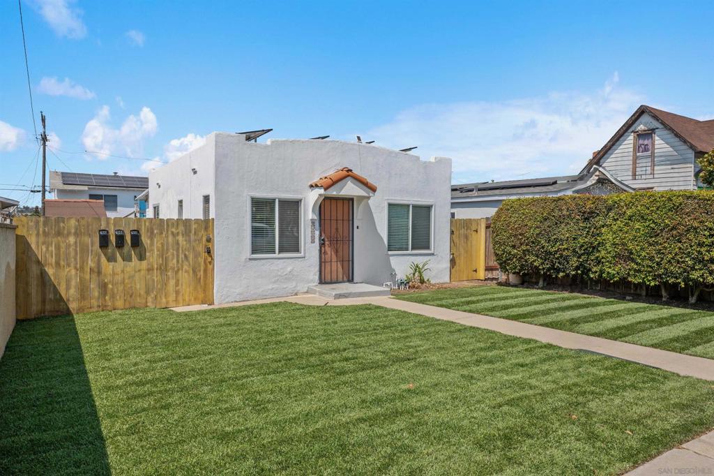 Turnkey and income-producing, this fully renovated and furnished triplex in Logan Heights offers an exceptional investment opportunity with projected short-term rental income of up to $12k-15k per month. Ideal for investors, house hackers, or multigenerational living, the property includes three updated and private residences on one lot—each designed for immediate rental use. The front home at 2950 Franklin Ave is a spacious 3-bedroom, 1-bathroom unit with approximately 1,050 sq ft of living space. Behind it, the lower ADU (2952 Franklin) features a stylishly designed 1-bedroom, 1-bathroom layout with a large kitchen, modern finishes, and a mini-split system. Above that, the upper unit (2948 Franklin) is another bright and airy 1-bedroom, 1-bathroom space, also equipped with a new mini-split system. All units are thoughtfully furnished and move-in ready, allowing for quick occupancy or rental turnover. This property is packed with value-added features, including owned solar panels, an EV charging station, gated off-street parking for three vehicles, and a fully fenced lot with an expansive turf yard—perfect for entertaining or pet-friendly stays. Located in a walkable, rapidly appreciating neighborhood, you’re just minutes from Balboa Park, the San Diego Zoo, Downtown, Little Italy, beaches, and major freeways. Whether you’re looking to live in one unit and rent the others, operate a high-performing short-term rental portfolio, or simply hold a strong cash-flowing asset, this Logan Heights triplex checks all the boxes for modern, turn-key investing.