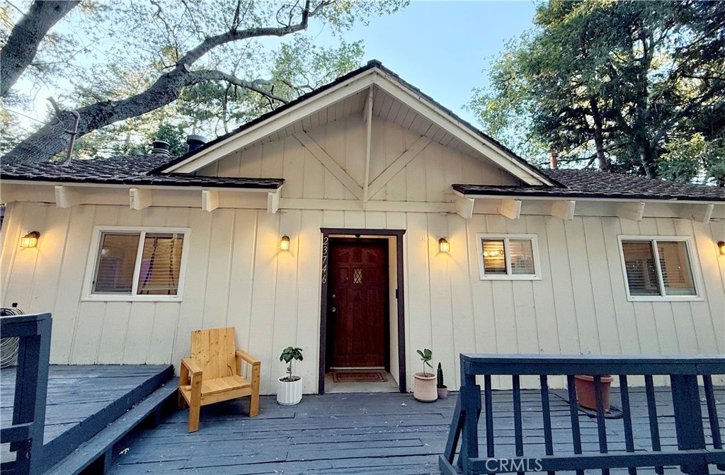 Welcome home! This 3 bedroom 2½ bath home boasts beautiful views of the forest. Upon entering the home, you are greeted with a large open floor plan perfect for entertaining and enjoying the vast views from the comfort of the updated fireplace or outside on the deck. On the main level you have two bedrooms and a full bathroom. The main living room has large vaulted ceilings that flows into the kitchen area, giving you endless possibilities for entertaining or simply enjoying the serenity of the forest views. The home has updated double paned windows/sliding doors and a newer 40 year roof installed in 2016. Continue down the stairs to the primary bedroom and another living area complete with a second fireplace and deck. There is a bonus room which could be used as a 4th bedroom as well. Very close to downtown Crestline and Lake Gregory.