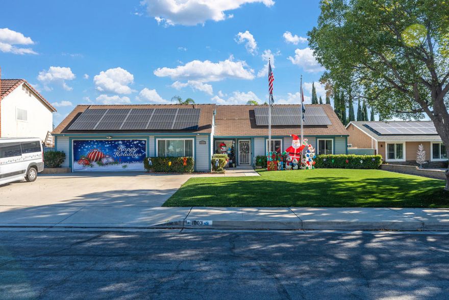 This well-maintained 3-bedroom, 2-bathroom home is located in a quiet neighborhood with convenient access to the 210 and 10 freeways. The home features modern upgrades throughout, including stainless steel appliances, recently renovated bathrooms, and durable LVP and tile flooring. A spacious laundry room off the kitchen offers ample space and versatility, easily doubling as a crafting room or home office. Additional highlights include a tankless water heater, whole-house water filtration system, reverse osmosis system, and leased solar panels for energy efficiency.Designed with accessibility in mind, the home includes wheelchair ramps for easy entry and a walk-in shower. The primary suite features a walk-in closet and a large bay window that fills the space with natural light. Outdoors, the property boasts high-grade artificial turf in both the front and backyard for low-maintenance living, a large covered patio ideal for entertaining, two Tuff sheds for extra storage, and a greenhouse.