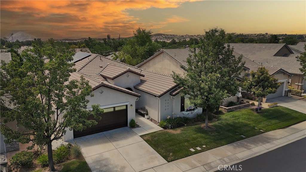 BEAUTIFULLY UPGRADED 'LAUREL II' Model (SINGLE STORY 2 BR + 2 BA + Office/Den - 2200 Sq Ft) - PAID OFF SOLAR (only 2 years old - Will be paid at COE) - Many Upgrades & Features include: Stylish Vinyl Flooring; Plantation Shutters; Fabulous OPEN COUNTRY KITCHEN which Opens to the Great Room, and has a Cozy Eating area, Granite Counters, Island & Breakfast Bar, Spacious Pantry, and Lots of Cabinetry which has been Redone; Pricey Wainscoting; Crown Molding; Attractive Electric Fireplace may be included; Custom Fans & Lights. There is a partial View of Snow Capped Mountain Tops from a Beautiful Fully Fenced Yard, which is like an Outdoor Living Room - Serene & Private ...... FOUR SEASONS goes beyond just a place to live - It's a vibrant community designed to keep you Active & Engaged, offering: THREE Club Houses; A Restaurant; Beauty Salon; Massage Parlor and Facial Salon; THREE Swimming Pools & Spa Areas with one Indoor Heated Pool; Movie Theatre; Billiards, 3 FITNESS CENTERS with state-of-the-art equipment, BBQ & Picnic Areas, Tennis Courts; PICKLE BALL COURTS, Paddle Tennis, Shuffleboard, Horseshoe and Putting Green, 6+ MILES of Nature/Hiking Trails; DOG PARK, and So Many Wonderful Activities & Clubs to meet new Friends and be as Active as you choose. FOUR SEASONS is approximately 30 miles from Palm Springs, at a higher elevation for a cooler climate to experience all of the four Seasons; Close to Shopping Centers, (including the World Famous Cabazon Outlet) Restaurants & Casinos, MEDICAL CENTERS/FACILITIES (Literally across the street from Loma Linda & Beaver Medical) - This Picturesque Community is surrounded by rich ranch lands with a Scenic backdrop of 2 Mountain ranges.