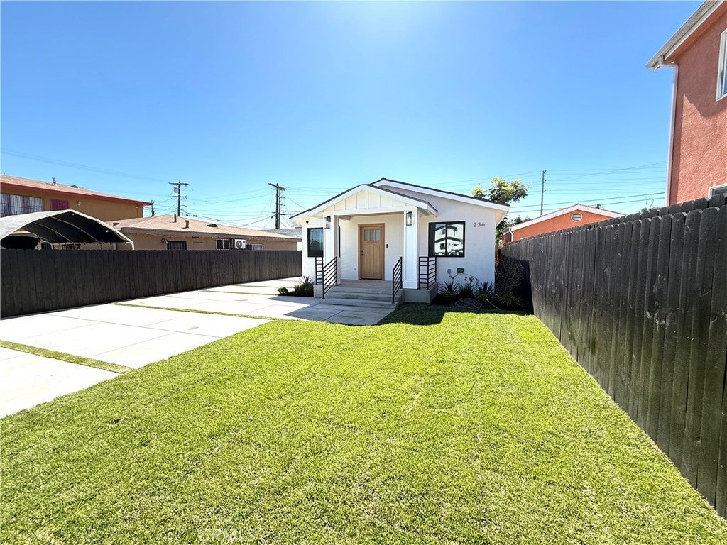 Photo of 236 E E 99th ST, Los Angeles, CA 90003 (MLS # DW26215150)