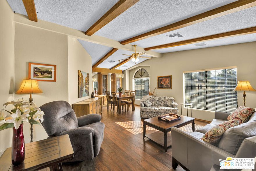 MOVE-IN READY & PRICED TO SELL!  This spacious 2 Bed / 2 Bath home offers 1,920 sq. ft. of comfortable living in one of the area's most desirable mobile home communities. Enjoy mountain views from the bright & airy screened-in front patio. Inside, a welcoming foyer leads to a formal living room and dining area. The generous great room, complete with a wet bar provides the perfect setting for entertaining. The roomy primary bedroom features a surprisingly large walk-in closet and en-suite bath with dual vanities.  Recent 2023 updates include a new roof and exterior paint, as well as new granite countertops, sink and faucet in the kitchen. The home is being sold furnished (per inventory list). Outside, the attached carport provides covered parking for two cars and extra storage in the shed. The Canyon's amenities include two sparkling pools and spas, a clubhouse, library/card room, billiard room, fitness room, crafts room, indoor shuffleboard, and a beautiful multi-function room with a stage and professional-style kitchen, ideal for hosting events. This home is conveniently located near the clubhouse, main pool, and tennis/pickleball courts.  The Canyon is a gated, well-maintained 55+ community. Buyers must obtain park approval, which requires a minimum 750 credit score and proof of income three times the monthly space rent. One pet up to 20 lbs is permitted. Buyers and their agents to verify current space rent and square footage.  With Palm Springs Airport, shopping, and restaurants just minutes away, this home is perfect for year-round living or as a vacation retreat.