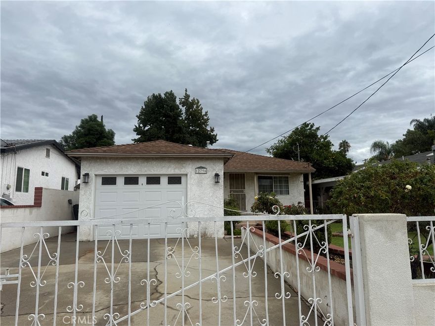 Looking for a cozy starter home in Sylmar? This 2-bedroom, 1-bathroom house sits on a generous lot and offers a simple, functional layout that’s ready for your personal touch. Built in 1953, it still has its original charm, but there’s plenty of room to make updates and put your own style on it.



The backyard is low-maintenance and perfect for enjoying year-round, featuring beautiful AstroTurf that stays green no matter the season. It’s a great space for kids, pets, or hosting friends, without the hassle of constant upkeep.



Located in a well-established area, you’re close to local schools, parks, and shops—everything Sylmar has to offer. This home is a rare find at this price point and is ready for someone to step in and make it their own.