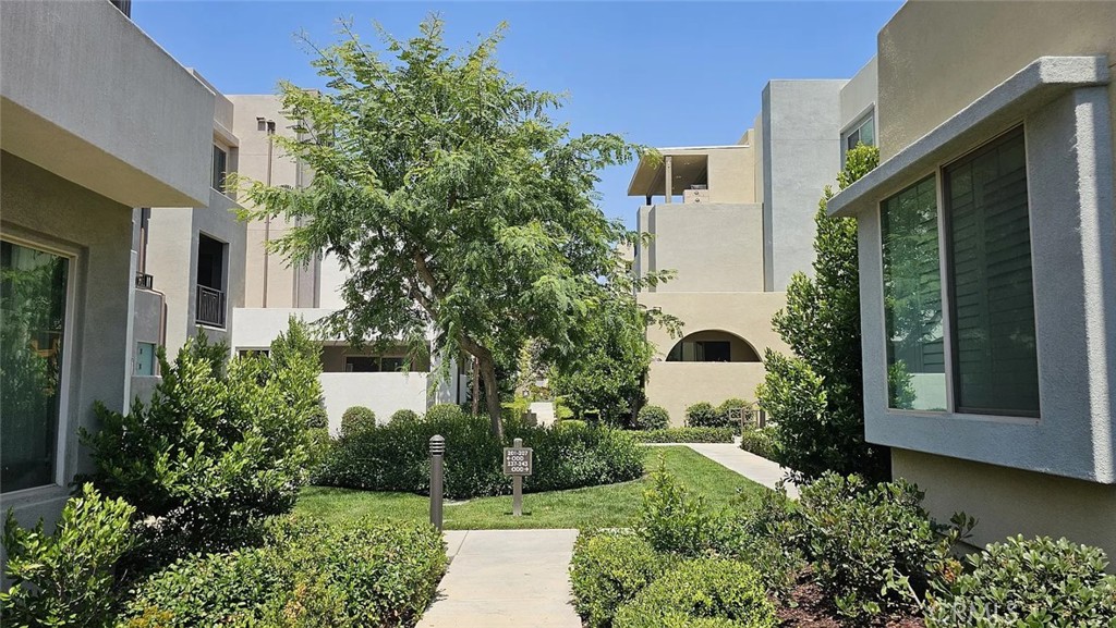 Enjoy great living in Irvine in one of the newest neighborhoods in the Great Park. This distinguished three bedroom four bath condo is available now.
With easy access to all that the Great Park offers such as shopping, dining, Hoag and Kaiser Hospitals, ice skating, baseball, soccer, tennis and swimming, and close to freeways, you will feel right at home.
High ceilings and lots of windows provide a bright and open environment for work, socializing, or play. The first floor includes a full bedroom with a full bath, great for visitors, grandparents or kids. The second floor has a large floor plan and opens to the gourmet kitchen with island. Refrigerator is included. Enjoy the connected patio in the evening with friends and family. The master bedroom has a very large suite bath. The upper floor has convenient, separate laundry room with washer and dryer included. There is a 2 car, oversized garage attached also. Lots of additional street parking is available. This is a wonderful place to call home!
