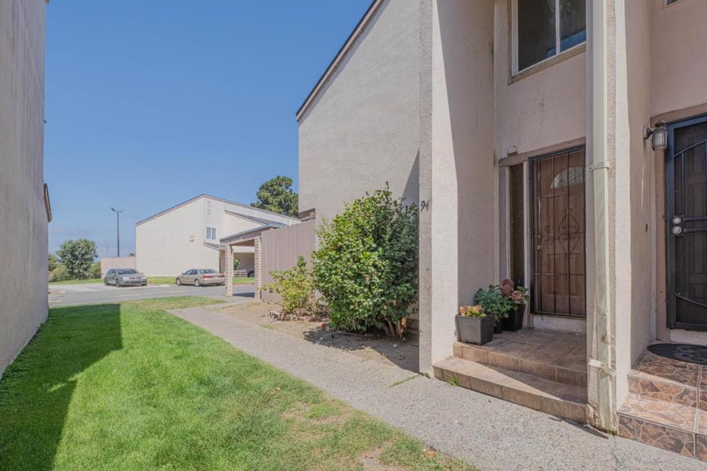 HUGE PRICE REDUCTION !!Welcome to this 2-bedroom, 1.5 bathroom condominium that's ready for your personal touch! This unit offers a functional layout , featuring a convenient half bathroom downstairs and two spacious bedrooms upstairs. Enjoy the practicality of an outdoor laundry area and potential to customize and upgrade the space to your liking-this home needs a TLC, making it a great opportunity .