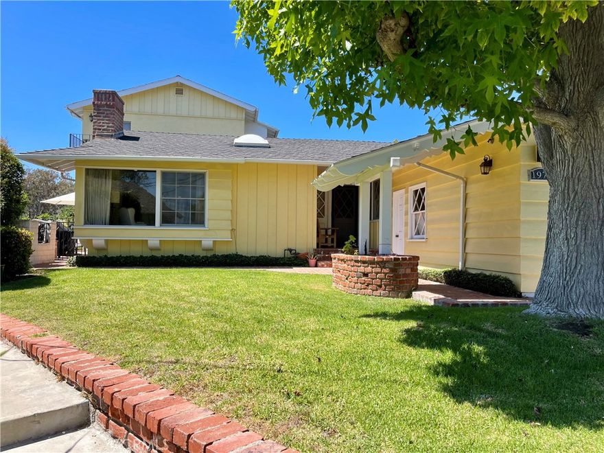 The Big Yellow House with the well is on the market for the first time since the 1950's!!!  Lovingly cared for by the same owners for decades, this expanded California ranch-style residence radiates warmth, character, and timeless appeal. Full of history yet thoughtfully updated through the years, it’s a home that immediately makes you feel welcome.

Step inside to find light-filled interiors enhanced by skylights that bathe the rooms in sunshine throughout the day. The floor plan offers both generous gathering areas and quiet retreats both inside an out, perfectly suited for entertaining, relaxing, or simply enjoying the rhythm of everyday living. Classic charm blends seamlessly with smart enhancements, creating a bright, open flow that feels both inviting and functional.

From the kitchen, enjoy sweeping sightlines across the home and into the inviting yard, creating a seamless indoor-outdoor connection that encourages al fresco dining, morning coffee among the fruit trees, or hosting summer gatherings under the stars. The mature landscaping embraces the property, with multiple outdoor spaces designed for connection, celebration, or peaceful reflection.

The upstairs private suite is a true sanctuary, offering inspiring views of the harbor, ocean, and the rolling hillsides of Friendship Park. Imagine waking up to this breathtaking backdrop each day, or unwinding each evening as the sunsets paint the sky.

Cherished and maintained for generations, this home is more than just a residence.  A rare opportunity to own a piece of local history, where comfort, character, peak-a-boo views come together in perfect harmony.

Come see why this special home has been loved for so many years... and imagine the memories waiting to be made here by you.