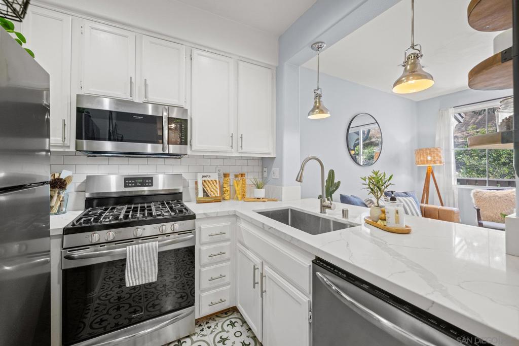 Lowest Priced 3 Bedroom Townhome in Carlsbad! Turnkey! Seller to consider offers between $725k-$775k. Private townhome with no front neighbors, abundant natural light, and attached 2-car garage. Primary suite on main level, features luxury vinyl plank flooring, barn door, stainless steel appliances, and stackable washer/dryer. Laminate flooring throughout. Outdoor spaces include a first-floor patio and second-level balcony. Community pool and spa. Rancho Carrillo offers the perfect blend of convenience and natural beauty. Miles of walking trails and the Rancho Carrillo Swim Center complete with heated pool, spa, and clubhouse. Bressi Ranch Square just a stone's throw away, featuring a variety of fantastic restaurants such as Tommy V's, Giola, Casero, Panini Grill, Mendocino Farms, and Board & Brew. You'll also find all your shopping essentials nearby, with Trader Joe's, Stater Bros, Sprouts, Bevmo, CVS, Target, and Starbucks just around the corner. If you're looking to explore the great outdoors, Rancho Carrillo provides hiking trails for outdoor enthusiasts. Additionally, the historic Leo Carrillo Ranch is a treasure nearby, offering a glimpse into the past, a chance to explore the grounds, learn about Leo Carrillo himself, and partake in community events hosted by the City of Carlsbad.