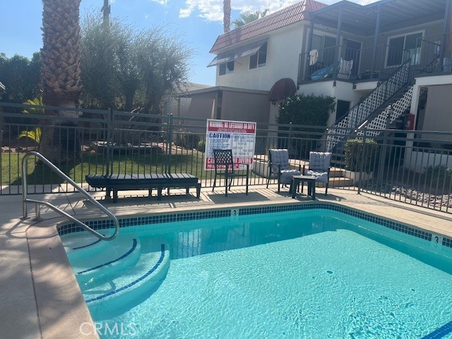This 2 bed 2 bath 2 story unit is located in the Sunset Villas Complex and the entire building was recently renovated The exterior of the property was completely remodeled with new exterior paint , all new landscaping, remodeled pool area with 2 pools and a spa , laundry facilities on site and upgraded Air Conditioning and new windows. The parking are and driveway were resurfaced, new exterior lighting and security camera system. The unit itself has just been completely renovated with all new appliances including refrigerator, microwave, stove and dishwasher. Wood floors, new paint, new blinds and new hardware and ceiling fans and new countertops. Unit is available for yearly lease or longer.