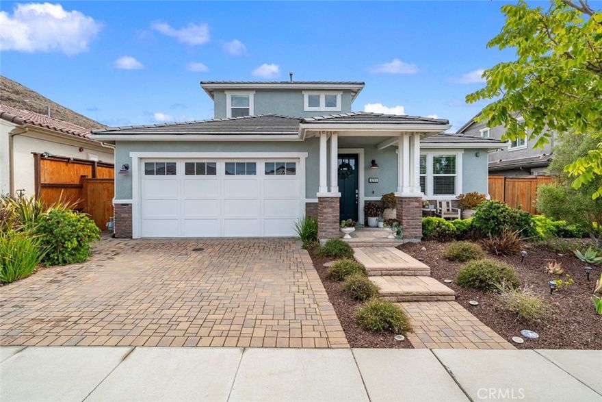 Exceptional Serra Meadows home beautifully crafted with designer touches, modern comforts, and the ease of single-level living with the bonus of a private upstairs retreat. With four spacious bedrooms and three full bathrooms, the thoughtfully designed layout is perfect for everyday living, entertaining, or hosting guests.
The main level welcomes you with an airy, light-filled open floor plan that seamlessly connects the living, dining, and kitchen areas. The chef’s kitchen features modern finishes and flows naturally into the living room, where an upgraded Milgard sliding glass door opens to your private outdoor space. Three generously sized bedrooms are conveniently located on the main floor, while the upstairs ensuite provides a peaceful haven—ideal for guests, multigenerational living, or a quiet home office.
Additional highlights include: Central A/C for year-round comfort, Tesla charger in the attached two-car garage, Hand-set paver driveway offering exceptional curb appeal, Double-pane windows and fire sprinkler system for safety and efficiency
Perfectly situated in the vibrant Serra Meadows community, you’ll enjoy being just minutes from SLO Public Market, San Luis Obispo Regional Airport, Cal Poly, award-winning wineries, and all the best the Central Coast has to offer.
Don’t miss your chance to own this stylish, energy-efficient home—schedule a showing today, because this one won’t last!