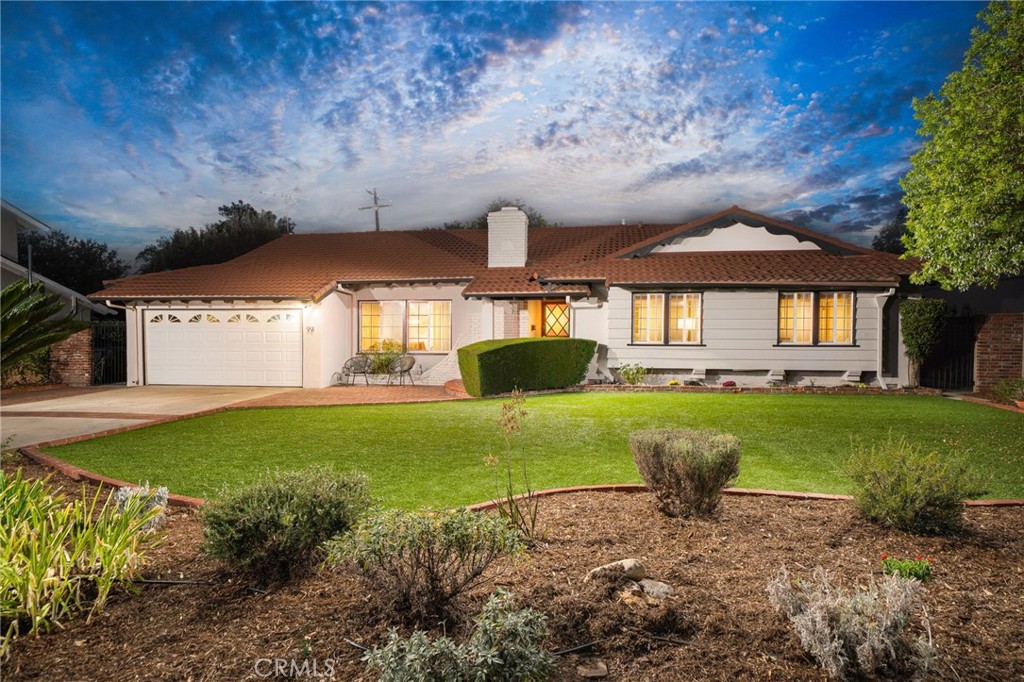 Welcome to this beautifully updated 3-bedroom, 2-bathroom home in one of Claremont’s most desirable neighborhoods. Situated on a spacious 10,881 sq ft lot, this 2,044 sq ft residence blends timeless charm with modern upgrades—offering a lifestyle of comfort, convenience, and style. From the moment you arrive, the inviting brick porch and formal entry set the tone.
Step into a spacious living room filled with natural light, featuring a picturesque window, cozy fireplace, and double pocket doors for added privacy. The heart of the home is the stunning remodeled kitchen, complete with a large center island, quartz countertops, Cle Zellige tile backsplash, new cabinetry, and brand-new stainless steel appliances. The open-concept family room/great room flows seamlessly to the backyard through a large sliding glass door—creating an ideal space for indoor-outdoor living and entertaining. The private primary suite includes ample closet space and an updated en-suite bathroom with a walk-in shower and modern vanity. Two additional bedrooms share a stylish, fully remodeled hallway bathroom with a tub/shower combo. Enjoy everyday convenience with an indoor laundry room with door to backyard, and peace of mind with recent upgrades including: dual-pane windows, remodeled kitchen and bathrooms, new water heater, new patio cover with ceiling fan low-maintenance artificial turf, updated garage lighting.
Step outside into your private backyard oasis, designed with entertaining in mind. Enjoy a brand-new covered patio, lush artificial turf, mature fruit trees, ivy-covered fencing, and a built-in firepit for cozy evenings under the stars. An oversized two-car attached garage with direct access, and a wide driveway adds to the functionality of this move-in-ready gem. Located within the top-rated Claremont Unified School District and just minutes from The Village’s boutique shops, restaurants, and parks, this home truly has it all.