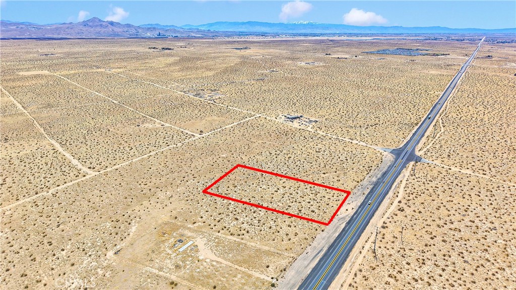 2 acres located of HWY 395. This scenic desert Lanscape is flat with easy access could be used for variety of outdoor activities.