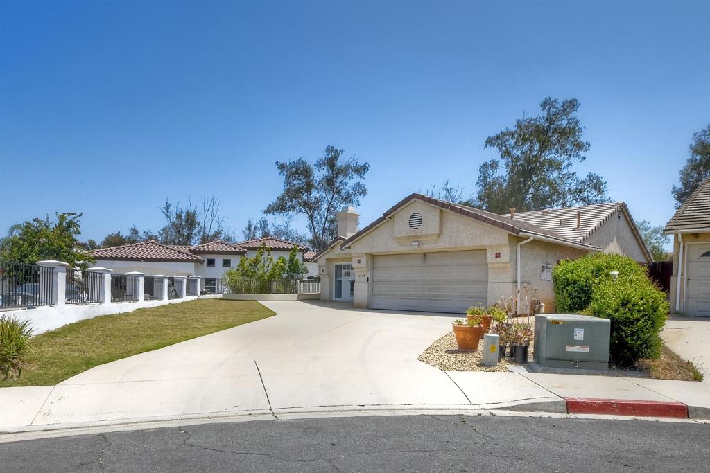Charming Ranch-Style Home in North Escondido Welcome to this inviting 3-bedroom, 2-bath home nestled in the heart of Escondido. Boasting an open floor plan and abundant natural light, this home offers a warm and welcoming atmosphere perfect for both relaxing and entertaining. The spacious living room features a cozy fireplace, creating a comfortable gathering space. The seamless flow from the living area to the dining and kitchen spaces enhances functionality and ease of living. Enjoy indoor-outdoor living with a private back patio—ideal for dining al fresco or weekend lounging. Don't miss this opportunity to own a centrally located home close to shopping, schools, and parks, all while enjoying the peace and privacy of cul-de-sac living.