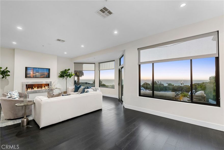 Welcome to a breathtaking blend of luxury, style, and amazing ocean views in this fully remodeled coastal gem. With over 4,000 square feet of meticulously designed living space, this 4-bedroom, 4.5-bath home sets a new standard for modern elegance.

Step inside and be instantly captivated by the gorgeous ocean views that fill the main living areas with a serene, natural beauty. The heart of the home, a chef’s kitchen is a culinary dream equipped with state-of-the-art appliances, custom finishes, sleek quartz countertops, flowing seamlessly into a formal dining area and a cozy family room with a sleek fireplace which opens to an expansive balcony, offering the perfect setting for sunset dinners or morning coffee with uninterrupted views of the ocean. From the moment you step through the grand entrance, you're greeted by stunning open-concept interiors, flooded with natural light. Every detail in this residence has been meticulously crafted, blending sophistication with functionality. The main level features all 4 bedrooms, including 2 with private bathrooms for the ultimate in comfort, while two others share a beautifully appointed bathroom. The primary suite is a private sanctuary, complete with a spa-inspired bath and custom walk-in closet. The primary suite is a true retreat, complete with a spa-like bathroom featuring a freestanding tub, dual vanities, and a custom walk-in closet. Each additional bedroom boasts unique design touches, ample storage, and high-end finishes, making this home as functional as it is beautiful.

Downstairs, discover a host of luxury amenities, including a dry sauna, full laundry room, a spacious playroom, and an additional full bathroom. A three-car garage offers ample space, plus additional parking spots for guests—ideal for gatherings.

In the backyard, indulge in your own private paradise with a lush lawn, beautiful gazebo and room to create your dream outdoor oasis. Located in a prestigious Rancho Palos Verdes neighborhood with both luxury and leisure in mind, this home is an invitation to live at your best. Part of the award-winning Palos Verdes Unified School district. Easy access to shopping center, with grocery stores, restaurants, golf courses and hiking trails.