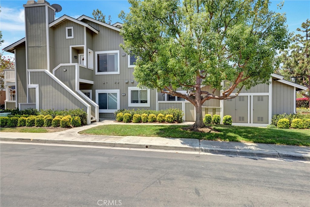 Welcome to this charming 2 bedroom/2 bathroom townhouse located in the Northwood Timberline community in the highly sought-after area of Irvine! This beautiful upper unit property boasts tall ceilings which shows light & bright with a lot of natural light! This home features granite countertops and stainless steel appliances with upgraded flooring throughout. The refrigerator, washer and dryer are included with the sale of the property as an added benefit. Enjoy the sunny balcony with cool breezes by day or snuggle up to the cozy fireplace by night. The HOA is super low and the community features two pools & two hot tubs as well as a playground for the kiddos, all within a leisurely stroll. You can park your vehicle in either your garage with ample storage or an assigned covered carport. There are also plenty of visitor parking spots which are ideal for having guests. Enjoy divine Irvine & its close proximity to shopping, restaurants, Heritage Community Park as well as other attractions.