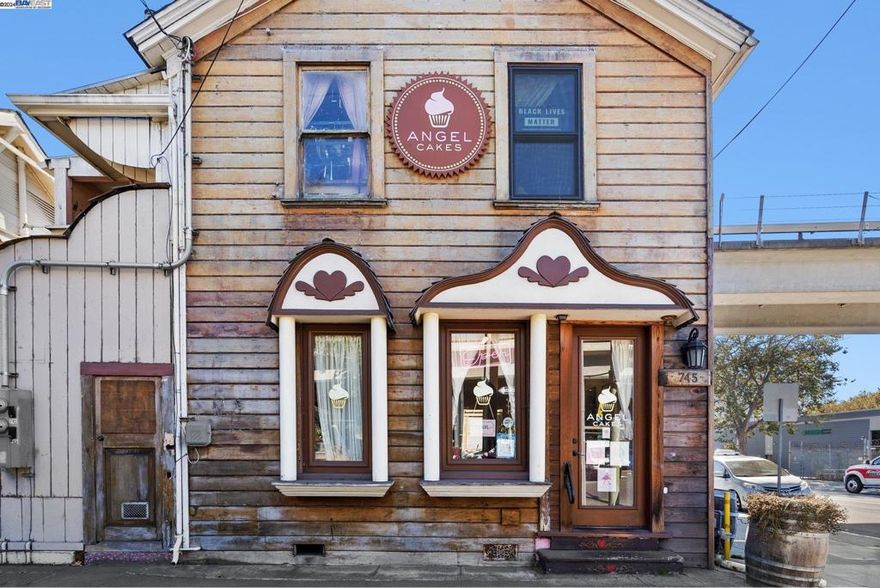 Amazing opportunity to own this historic building with excellent long term tenants in place. Iconic Angel Cakes bakery attracts clients from all over the bay for their tasty, decorative baked goods. There is a two bedroom, one bathroom residential unit above with long term tenant. Amazing location near 880 on ramp and just a few short blocks to Jack London Square and ferry terminal. This great investment is also listed in tandem with 721 5th St for $1,400,000. These gems can be purchased together or separately.