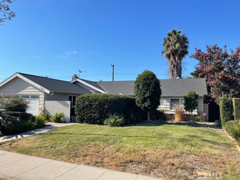 This is one for the Savvy Investor! Single story home, in a nice neighborhood, sitting on a large flat lot with tons of potential! Features of the home include recessed lights and updated vinyl windows thru out. The large bright open kitchen features a spacious peninsula which provides ample space for cooking and entertaining. Adjacent to the kitchen, the dining room is large enough to host those family dinners and has sliding doors to the large covered patio for dining in or out. The living room has a fireplace and laminate flooring. There are three bedrooms and the primary has an attached bath with walk in shower. The hall guest bath with tub, has two sinks and lots of storage in the vanity. The washer and dryer are in the garage with easy access through the side door. The large flat back yard has a Tuff Shed and another small shed just waiting to be re imagined. New garage door and newer air conditioner. Lots of possibilities with this home for the person who can see the potential. If that's you - come and take a look!