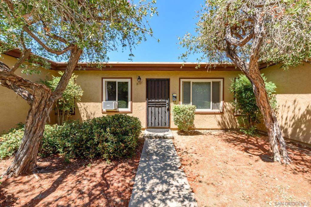 Gorgeous Condo in an Unbeatable Location! Located just steps from Mission Trails Regional Park and Kumeyaay Lake, this beautifully updated modern condo lives like a detached home—no upstairs neighbors and everything on one convenient level. Situated in a Planned Unit Development (PUD) community, this home offers comfort, style, and privacy. The kitchen features stainless steel appliances, elegant Volakas marble countertops with a satin finish, a new backsplash, recessed lighting, and an abundance of cabinet and pantry space. Enjoy seamless indoor-outdoor living with direct access to a spacious private patio—perfect for entertaining, relaxing, or gardening. Fresh paint and stylish vinyl plank flooring run throughout the home. See supplement! You’ll appreciate the open-concept layout with thoughtful designer upgrades, including custom built-ins, a charming barn door, and a trendy shiplap accent wall. A skylight in the bathroom fills the space with natural light, while a full-size washer and dryer are tucked conveniently into the hallway closet. Both bedrooms feature ceiling fans and AC window units for year-round comfort. The large enclosed patio includes an artificial grass area—ideal for pets! Just a one-minute stroll to the community pool. HOA covers water and trash, and the unit includes two assigned parking spaces. With quick access to the 52 and 125 freeways, this prime location makes commuting and exploring a breeze. Come experience the beauty and warmth of this welcoming community—you’ll love calling it home.