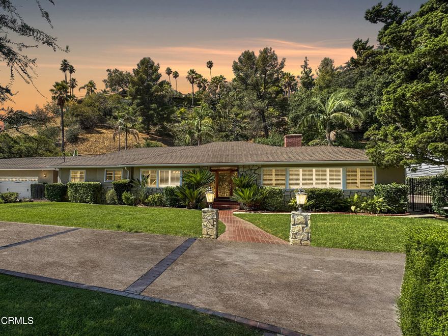 Tucked behind secure gates in the peaceful Glendale Hills, this beautifully updated single-level ranch delivers the perfect blend of privacy, comfort, and indoor-outdoor living. A spacious motor court and timeless stone-accented facade set the stage for what's inside.Step through the beveled glass entry door into a bright, welcoming interior. The living room is filled with natural light and anchored by a classic marble fireplace. Across the way, the formal dining room opens to a chef-inspired kitchen with quartz countertops, stainless steel appliances--including double convection ovens, gas cooktop, range hood, dishwasher--and designer fixtures. The kitchen and breakfast nook overlook the motor court, while the adjoining family room impresses with vaulted ceilings and French doors that lead to a large covered patio--an ideal spot for alfresco dining and entertaining.Beyond the patio, a gated pool and spa are surrounded by lush landscaping and a serene hillside backdrop. Inside, the private bedroom wing is thoughtfully designed: the primary suite offers generous closet space and an updated en suite bath; a second bedroom opens directly to the pool through French doors; and a third bedroom enjoys patio access, sharing a full bath with the second bedroom. A convenient laundry room with exterior access, powder room, and separate garage half-bath for poolside use add everyday functionality.Additional highlights include LED recessed lighting, crown molding, hardwood floors throughout, citrus trees, and a 4-car garage with built-in storage.Ideally located minutes from Verdugo Park, Oakmont Country Club, Montrose Shopping Park, and with easy access to The Americana at Brand, Glendale Galleria, Pasadena, Burbank, and DTLA--this rare lease opportunity combines modern upgrades, classic character, and a tranquil hillside setting.