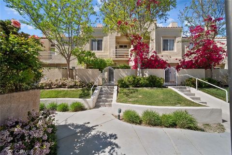 Photo of 25725 Perlman Pl #127, Stevenson Ranch, CA 91381 (MLS # SR26050960)