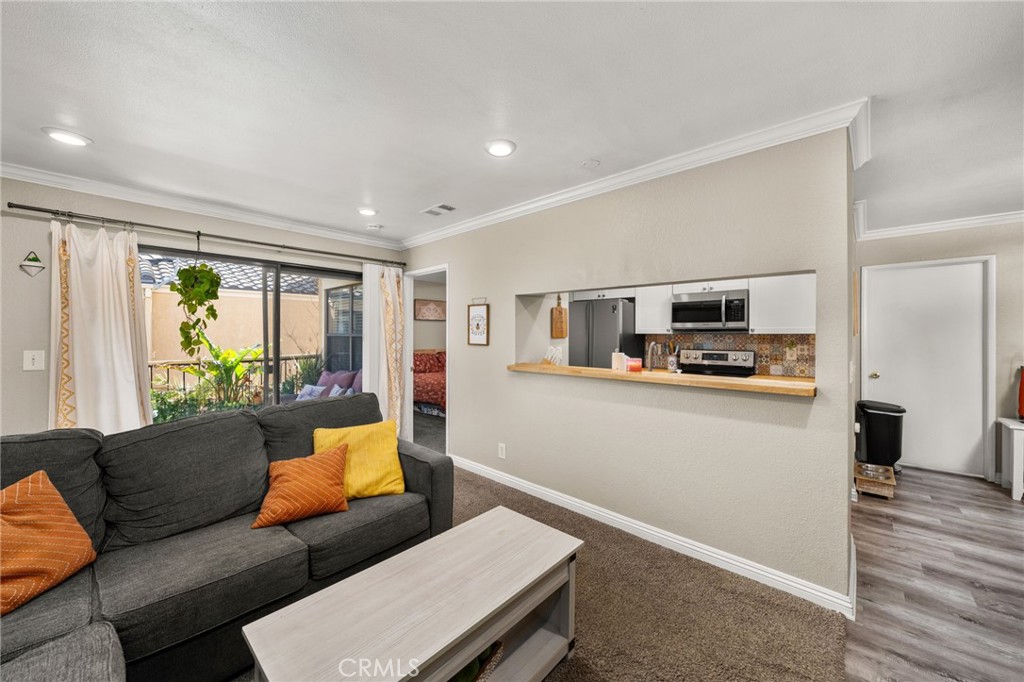 This move-in ready upstairs condo in a gated community is not only stylish (hello, brand-new kitchen, 2021!)—it's also in one of Rancho Cucamonga’s most desirable pockets, just around the corner from Trader Joe’s and the legendary Handel’s Homemade Ice Cream.
Enjoy the peace and quiet of no upstairs neighbors, relax on your private balcony with lush green views, and take advantage of resort-style amenities: pools, spa, tennis court, BBQ area, and meandering greenbelts perfect for a stroll.
Inside, you’ll love the spacious layout, separate dining and living areas, in-unit laundry, and a newer dishwasher to make life easier. Water and trash are included in the low HOA, and you’ll have assigned covered parking (Space 165).
Get your steps in on the nearby Pacific Electric Trail, spend weekends exploring Etiwanda Falls, shopping at Victoria Gardens or Ontario Mills, and enjoy quick airport access for those spontaneous getaways.
Whether you're sipping coffee from your Trader Joe’s haul or walking to grab a scoop at Handel’s, you’re going to love this prime Rancho Cucamonga location—and the unbeatable lifestyle that comes with it.