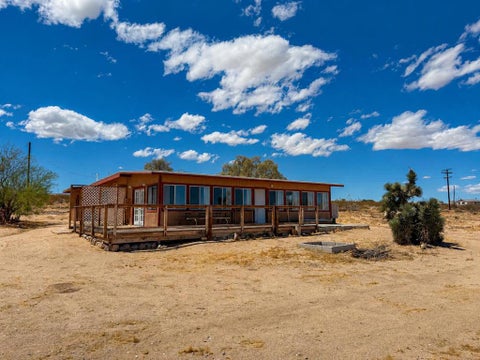 Photo of 4525 Kickapoo TRL, Landers, CA 92285 (MLS # 219152336DA)