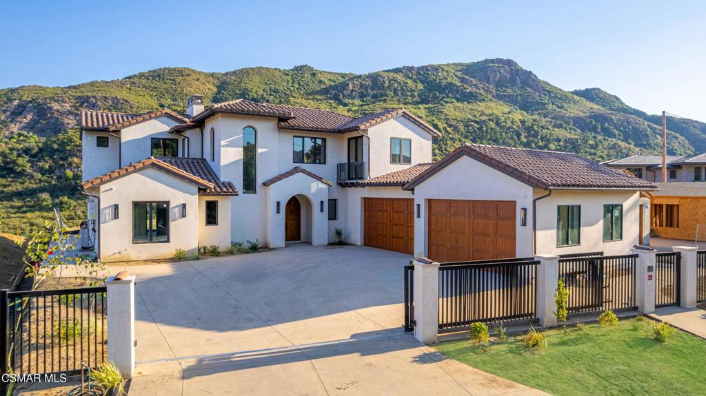 Brand New Luxury Home in the Santa Monica mountains.Welcome to your dream home nestled in the Santa Monica Mountains, offering breathtaking views from every room. This newly constructed estate masterfully blends modern elegance with natural beauty.Step inside to discover real hardwood floors, soaring 10-foot ceilings, and custom cabinetry throughout. The gourmet kitchen is outfitted with top-of-the-line Thermador appliances, ideal for entertaining or everyday luxury. An elevator provides seamless access to all levels of the home.Enjoy a glass of wine from your private wine cellar or relax on the heated patio while soaking in panoramic mountain views. The expansive second-story loft features a stylish wet bar, perfect for hosting.The downstairs primary suite offers privacy and comfort, while the 4-car garage ensures ample parking and storage. Additional features include a high-end security system, tankless water heater, and thoughtful smart-home touches throughout.Brand New Luxury Home in the Santa Monica Mountains - Minutes to Malibu BeachThis home offers the ultimate blend of mountain serenity and coastal convenience--don't miss this rare opportunity to own a slice of California paradise.