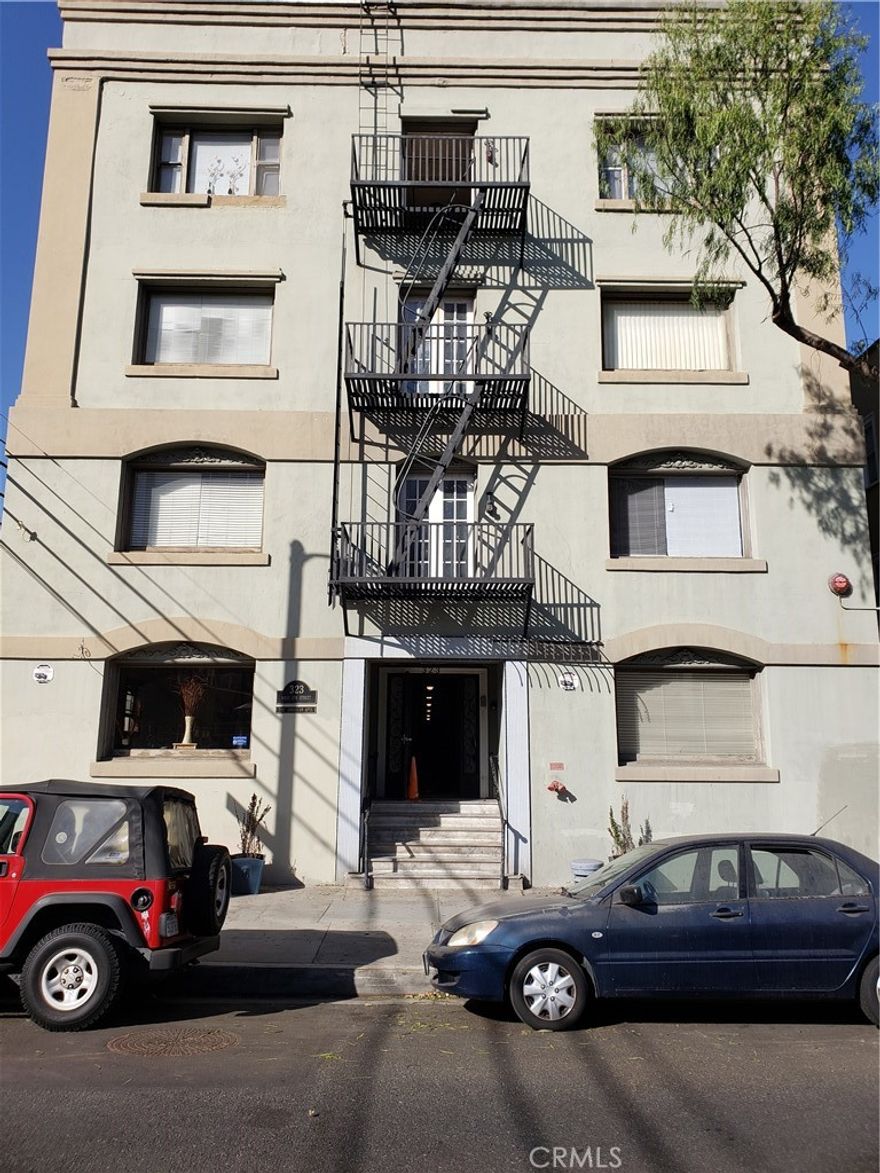 This is a studio apartment,  not a 1 bedroom, 364 Sqft.  3rd floor unit, stairs only, no elevator. Street Parking only, No assigned parking. 3rd floor unit. Incredible Downtown Long Beach studio located on the 3rd floor of the historic American Apartments (1923), offering charming city views and timeless character. This bright unit features a pull-down Murphy bed, hardwood floors, ceiling fan, and double-pane windows for comfort and efficiency.
The full bathroom includes a shower/tub combination, pedestal sink, tile flooring, ample cabinetry, and a small vanity area with mirror. The kitchen is equipped with a stove and refrigerator, tile countertops and flooring, and plenty of cabinet space.  Additional highlights include generous closet storage and a secure building.  Hot and cold water and trash are included. Prime location near the up-and-coming downtown corridor, just minutes from Pine Avenue, The Pike Outlets, Aquarium of the Pacific, Shoreline Village, world-famous dining, and the Metro Blue Line. Street parking only (no garage or on-site laundry). Nearby parking structures offer monthly parking options for a fee.